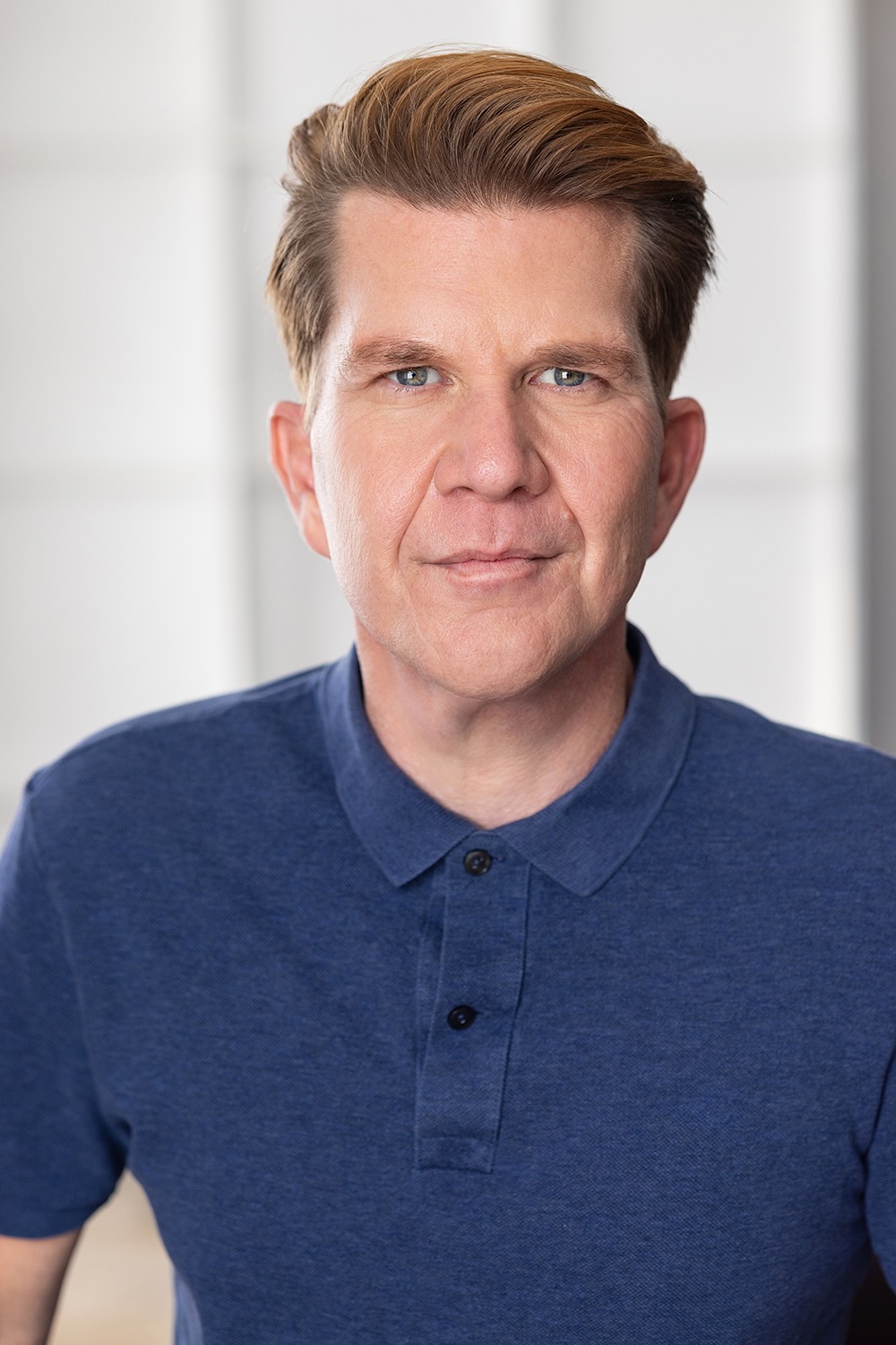 Jonas Åsberg character-style headshot with playful energy.